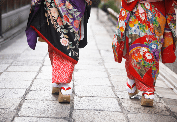 Maiko walking through the streets of Kyoto